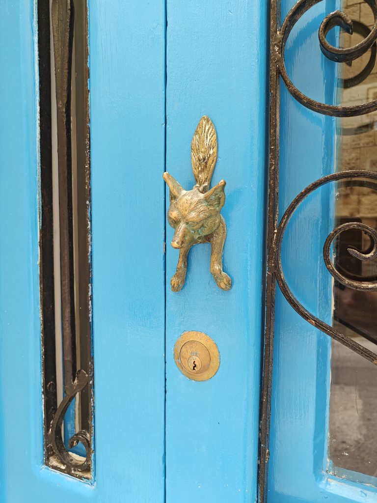 Maltese door handles
